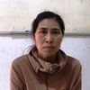 Đối tượng Phan Thị Hương bị bắt giữ tại cơ quan công an. (Ảnh: Thanh Tân/TTXVN)