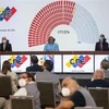Chủ tịch Hội đồng Bầu cử Quốc gia Venezuela Indira Alfonzo (giữa) công bố kết quả chính thức cuộc bầu cử Quốc hội, tại Caracas ngày 7/12/2020. (Ảnh: THX/TTXVN)