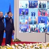 Thủ tướng Chính phủ Nguyễn Xuân Phúc-Chủ tịch ASEAN 2020 và các nhà lãnh đạo ASEAN-lãnh đạo 5 nước đối tác cùng chứng kiến Lễ ký Hiệp định Đối tác Kinh tế Toàn diện Khu vực RCEP. (Ảnh: TTXVN)