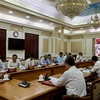 Cuộc họp giữa Thường trực Ban Chỉ đạo Thành phố Hồ Chí Minh về phòng chống dịch bệnh COVID 19. (Ảnh: Anh Tuấn/TTXVN)
