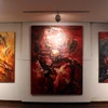 Các tác phẩm tranh được trưng bày tại triển lãm. (Ảnh: Trần Lê Lâm/TTXVN)