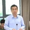 Ông Nguyễn Phước Lộc, Bí thư Đảng ủy, Phó trưởng Ban Dân vận Trung ương báo cáo tại buổi làm việc. (Ảnh: Văn Điệp/TTXVN)