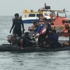 Lực lượng cứu hộ tìm kiếm chiếc máy thuộc hãng hàng không Sriwijaya Air gặp nạn tại vùng biển ngoài khơi Jakarta, Indonesia ngày 10/1/2021. (Ảnh: THX/TTXVN)