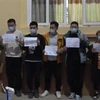 8 người Trung Quốc nhập cảnh trái phép, bị Công an tỉnh Cao Bằng phát hiện, bắt giữ. (Ảnh: TTXVN phát)