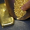 Vàng được giới thiệu tại một cửa hàng kim hoàn của Chopard gần Geneva, Thụy Sĩ. (Ảnh: AFP/TTXVN)
