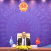 Thủ tướng Chính phủ Nguyễn Xuân Phúc phát biểu tại điểm cầu Hà Nội. (Ảnh: Thống Nhất/TTXVN)