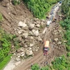 Hiện trường một vụ lở đất tại Majene, Tây Sulawesi, Indonesia, ngày 19/1/2021. (Ảnh: AFP/ TTXVN)