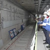Đường ray của đoàn tàu dưới tầng hầm B2 tại nhà ga Ba Son thuộc tuyến metro số 1 (Bến Thành-Suối Tiên) đã hoàn thiện. (Ảnh: Thanh Vũ/TTXVN)