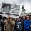 Người biểu tình giơ bức ảnh nạn nhân Sarah Halimi. (Nguồn: nytimes.com)