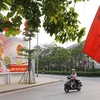 Tranh tuyên truyền, cổ động bầu cử trên phố Hoàng Cầu, Hà Nội. (Ảnh: Hoàng Hiếu/TTXVN)