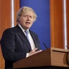 Thủ tướng Anh Boris Johnson phát biểu tại cuộc họp báo ở London ngày 5/4/2021. (Ảnh: AFP/TTXVN)