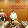 Chủ tịch Ủy ban nhân dân, Trưởng Ban chỉ đạo phòng, chống dịch COVID-19 tỉnh Lào Cai Trịnh Xuân Trường phát biểu tại buổi làm việc. (Ảnh: Quốc Khánh/TTXVN)