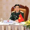Bộ trưởng Bộ Quốc phòng Việt Nam Thượng tướng Phan Văn Giang hội đàm trực tuyến với Bộ trưởng Bộ Quốc phòng Nhật Bản Kishi Nobuo. (Ảnh: TTXVN phát)