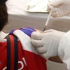 Tiêm vaccine ngừa COVID-19 tại Phnom Penh, Campuchia, ngày 2/3/2021. (Ảnh: THX/TTXVN)