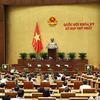 95,59% tổng số đại biểu Quốc hội biểu quyết thông qua việc điều chỉnh chương trình kỳ họp thứ nhất Quốc hội khoá XV. (Ảnh: Dương Giang/TTXVN)