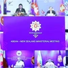 Thứ trưởng Bộ Ngoại giao Việt Nam Nguyễn Quốc Dũng và Bộ trưởng Ngoại giao các nước tham dự Hội nghị Bộ trưởng Ngoại giao ASEAN - New Zealand theo hình thức trực tuyến. (Ảnh: Phạm Kiên/TTXVN)