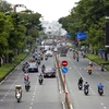Đông đúc các loại phương tiện giao thông trên đường Nguyễn Văn Cừ (Quận 5). (Ảnh: Thanh Vũ/TTXVN)