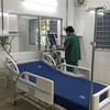 Lực lượng y tế kiểm tra lại trang thiết bị trước khi Trung tâm Hồi sức tích cực người bệnh COVID-19 tại TP.HCM đi vào hoạt động. (Ảnh: Lê Thúy Hằng/TTXVN)