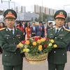 Lễ dâng hoa tại tượng đài Chủ tịch Hồ Chí Minh. (Ảnh: Trần Hiếu/TTXVN)