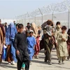 Người Afghanistan tại khu vực cửa khẩu Chaman, biên giới Pakistan-Afghanistan ngày 25/8/2021. (Ảnh: AFP/TTXVN)