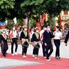 Đồng bào các dân tộc huyện Bắc Sơn diễu hành mừng lễ kỷ niệm. (Ảnh: Thái Thuần/TTXVN)