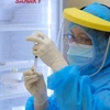 Vaccine được tiêm cho thai phụ tại Bệnh viện Hùng Vương. (Ảnh: TTXVN phát)