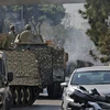 Binh sỹ Liban được triển khai tới hiện trường vụ đấu súng tại khu vực Tayouneh ở thủ đô Beirut ngày 14/10. (Ảnh: AFP/ TTXVN)