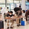 Trong bối cảnh dịch COVID-19, các du khách tới Quảng Bình thực hiện nghiêm các quy định phòng, chống dịch, khai báo y tế và tuân thủ 5K. (Ảnh: Võ Dung/TTXVN)