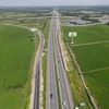 Đường 319 nối dài và nút giao với cao tốc Thành phố Hồ Chí Minh-Long Thành-Dầu Giây nhìn từ trên cao. (Ảnh: Công Phong/TTXVN)