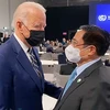 Thủ tướng Phạm Minh Chính gặp Tổng thống Hoa Kỳ Joe Biden tại Hội nghị. (Ảnh: TTXVN)