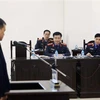 Đại diện Viện Kiểm sát tham gia phần xét hỏi bị cáo Hồ Hữu Hòa. (Ảnh: Phạm Kiên/TTXVN)