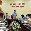 Chủ tịch UBND tỉnh Nam Định Phạm Đình Nghị phát biểu chỉ đạo tại cuộc họp trực tuyến với 10 huyện, thành phố để triển khai các biện pháp cấp bách phòng, chống dịch COVID-19. (Ảnh: Văn Đạt/TTXVN)