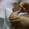 Tiêm vaccine COVID-19 tại Tuyên Quang. (Ảnh: Nam Sương/TTXVN)