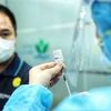 Tỷ lệ tiêm chủng vaccine COVID-19 cao là điều kiện quan trọng cho phép Việt Nam mở cửa trở lại các đường bay quốc tế.