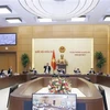 Ủy ban Thường vụ Quốc hội biểu quyết về việc ký Hiệp định Bảo hiểm xã hội giữa Việt Nam và Hàn Quốc. (Ảnh: Doãn Tấn/TTXVN)