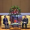 Chủ tịch Quốc hội Lào Xaysomphone Phomvihane và Chủ tịch Hội hữu nghị Việt Nam-Lào Trần Văn Túy tại buổi tiếp. (Ảnh: Văn Điệp/TTXVN)
