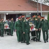 Lễ truy điệu và an táng hài cốt liệt sĩ Tô Kim Chủy và đồng đội cùng hi sinh trong Chiến dịch Điện Biên Phủ năm 1954. (Ảnh: TTXVN phát)