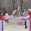 Các vận động viên tại lễ rước đuốc Olympic mùa Đông Bắc Kinh 2022 ở Bắc Kinh, Trung Quốc, ngày 2/2. (Ảnh: THX/TTXVN)