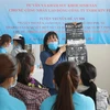 Tư vấn, khám sức khỏe sinh sản miễn phí cho nữ công nhân lao động tại Khánh Hòa. (Ảnh: Thanh Vân/TTXVN)