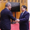 Thủ tướng Phạm Minh Chính tiếp ông Alok Sharma, Bộ trưởng, Chủ tịch Hội nghị Liên hợp quốc về Biến đổi khí hậu lần thứ 26. (Ảnh: Dương Giang/TTXVN)