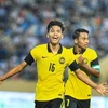 Cầu thủ Muhammad Syahir Bin Bashah (số 16) ghi bàn thắng thứ hai cho đội tuyển Malaysia. (Ảnh: Tuấn Anh/TTXVN)