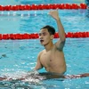 Niềm vui của vận động viên Phạm Thanh Bảo (Việt Nam) giành Huy chương Vàng nội dung 50m bơi ếch nam với thành tích 28 giây 28. (Ảnh: Phạm Kiên/TTXVN)