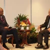 Bộ trưởng Quốc phòng Singapore Ng Eng Hen và người đồng cấp Mỹ Lloyd Austin. (Nguồn: straitstimes.com)