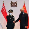 Bộ trưởng Quốc phòng Singapore Ng Eng Hen và Bộ trưởng Quốc phòng Trung Quốc Ngụy Phượng Hòa. (Nguồn: mindef.gov.sg)