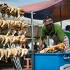Thịt gà được bán tại Bentong, ngoại ô Kuala Lumpur, Malaysia. (Ảnh: AFP/ TTXVN)