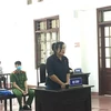 Bị cáo Lê Thị Kim Hoàn khai nhận hành vi phạm tội tại phiên tòa. (Ảnh: Vũ Hà/TTXVN)