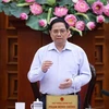 Thủ tướng Phạm Minh Chính chủ trì cuộc họp về việc cung ứng thuốc, vật tư y tế và giải pháp bảo đảm nguồn nhân lực cho ngành y tế. (Ảnh: Dương Giang/TTXVN)