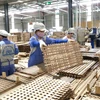 Sản phẩm đồ gỗ xuất khẩu sang Thụy Sỹ tại nhà máy của Công ty CP Woodsland Tuyên Quang. (Ảnh: TTXVN)