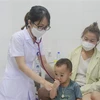 Bệnh nhi cúm A tại Quảng Ninh. (Ảnh: TTXVN phát)