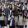 Người dân đeo khẩu trang phòng lây nhiễm COVID-19 tại Aichi, Nhật Bản, ngày 26/7/2022. (Ảnh: Kyodo/TTXVN)